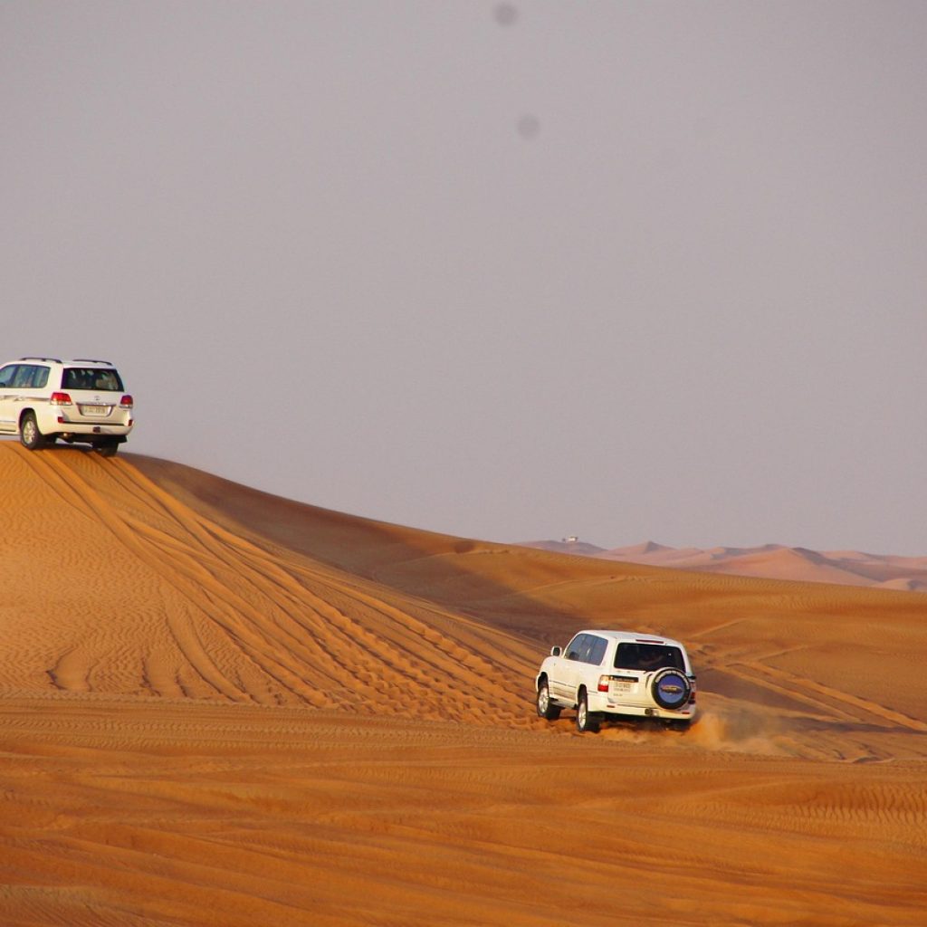 Desert Safaris Dubai with dune bashing, camel rides and sunset views in the Dubai desert