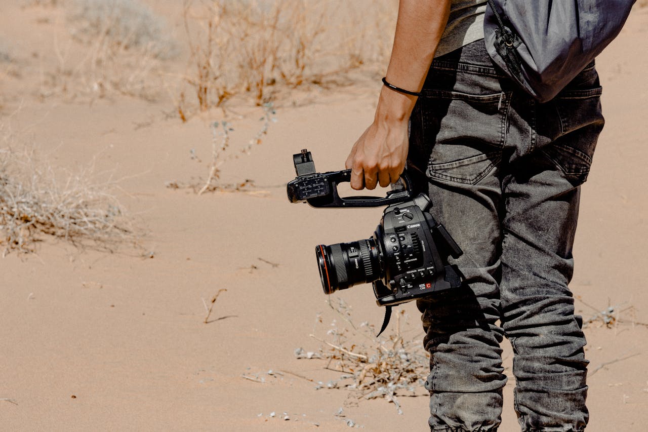Cameraman in dubai desert