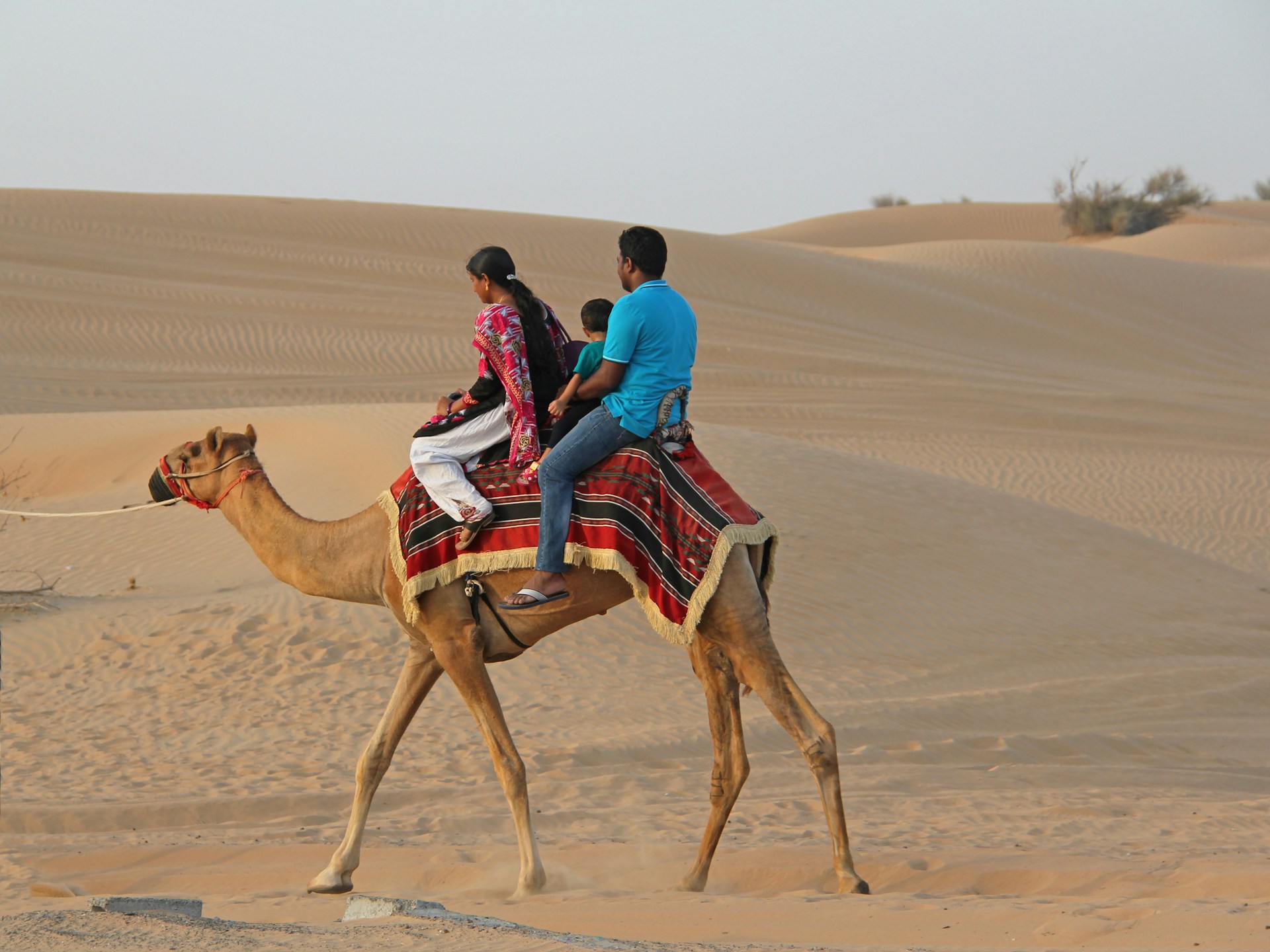 Happy family enjoying desert safari Dubai